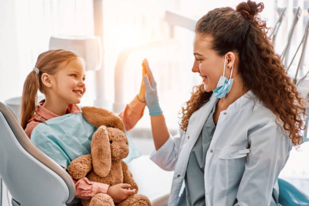 Pediatric dentist in Waterloo helping child overcome dental fear